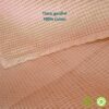Cape de bain bébé vieux rose en coton gaufré nid d'abeille et teinture végétale naturelle par Linen Color
